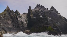 Skellig Michael Island And Waves Crashing On Its Rocky Shore