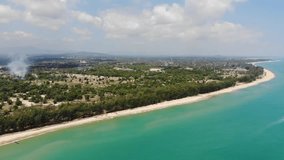 Aerial video of turquoise ocean seascape scenic at Terengganu beach, Malaysia.