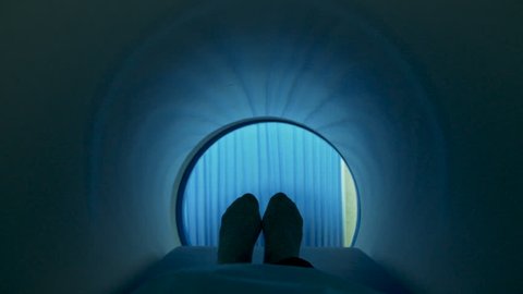 A patient moving out of mri scan machine