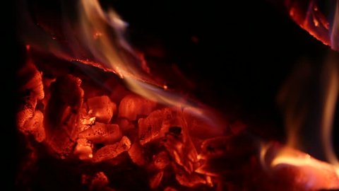 Footage of charcoal flame, in fire