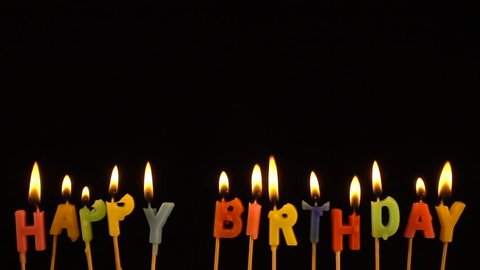 colourful happy birthday candles being extinguished Stock Footage Video ...