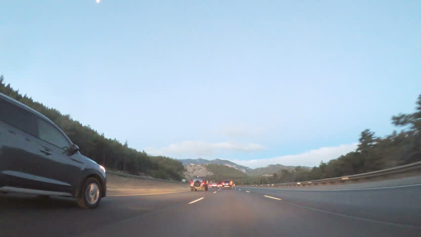 Denver, Colorado, USA-January 7, 2018-POV-Driving on Interstate highway I70 at sunrise. | Shutterstock HD Video #1008992876
