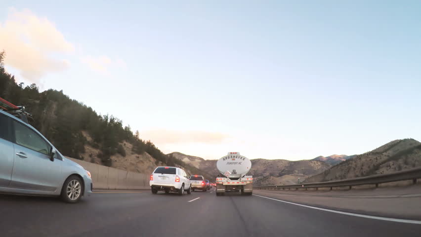Denver, Colorado, USA-January 7, 2018-POV-Driving on Interstate highway I70 at sunrise. | Shutterstock HD Video #1008992906