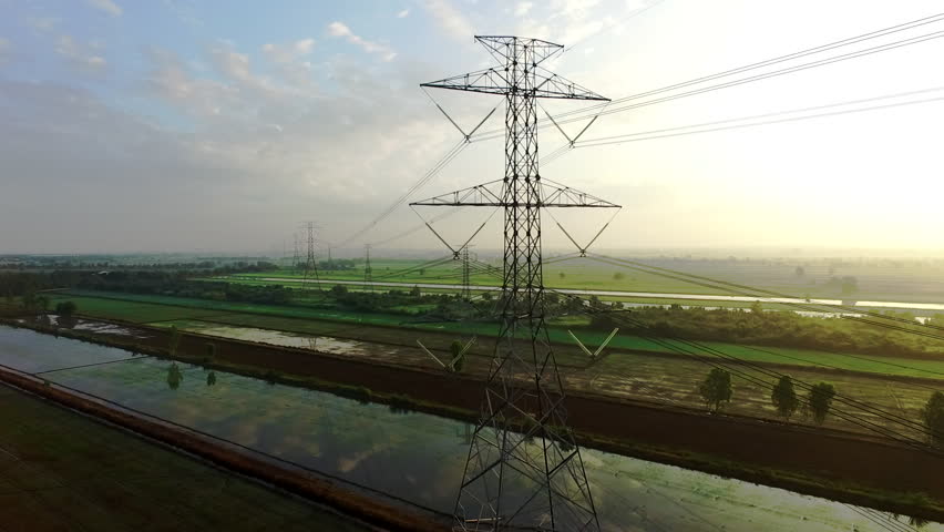 view footage of high voltage electricity tower and power lines under the beautiful sky Royalty-Free Stock Footage #1008997415