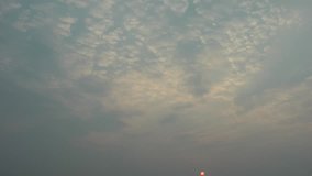 Sun rising Between Clouds – Sunrise Time Lapse Video Clip