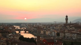 Panoramic view of Florence at sunset, time lapse. On the left there is Ponte Vecchio and on the right Palazzo Vecchio. Video taken at sunset from Michelangelo panoramic terrace.