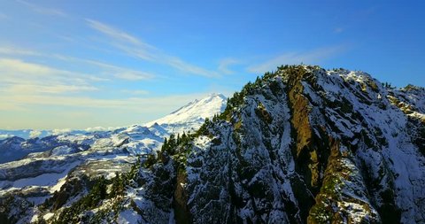 Snowy Mountain Peak With Pine Trees On Alpine Summit - Washington, USA - Artist Point - Mount Baker - 4K Drone Footage