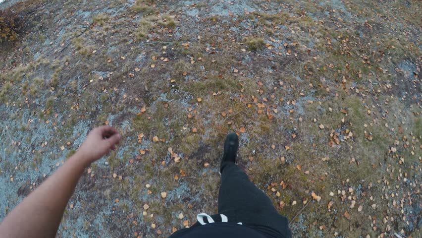 Point of view riding a bicycle on a forest road alongside Lake Sfanta Ana, Romania