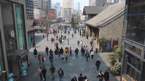 Chengdu Mar 1,2018: slow motion of people walking in the Taikoo Li in Chengdu Sichuan China.