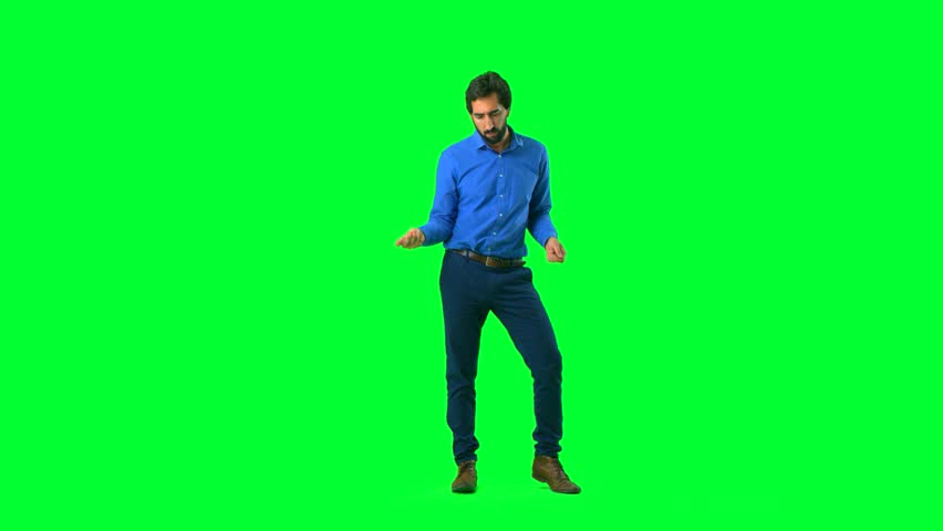 Young Man Dancing Against Chroma Stockvideoklipp (helt royaltyfria ...