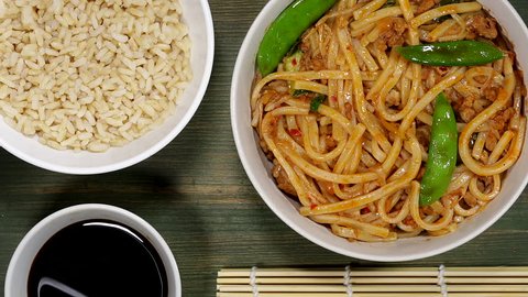 Chinese Style Sichuan Spicy Pork Noodles With Rice and Soy Sauce