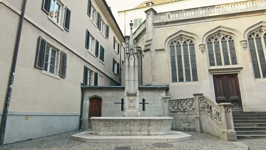 Fountain Helferei at the Zwingliplatz square in historic old town of Zurich, Switzerland