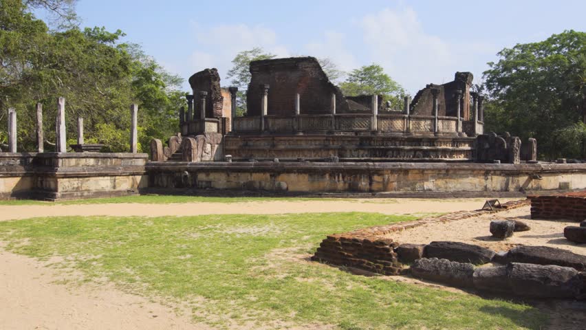 Crumbling brick walls and columns of the Vatadage. an important. historical religious site in Polonnaruwa. Sri Lanka. now in ruins. 4k video