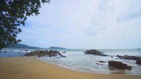 The coast of the Andaman Sea in cloudy weather. Phuket. Thailand. Stock footage in 4k resolution