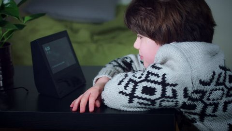 4K Child Boy Checking Weather on Smart Home Device