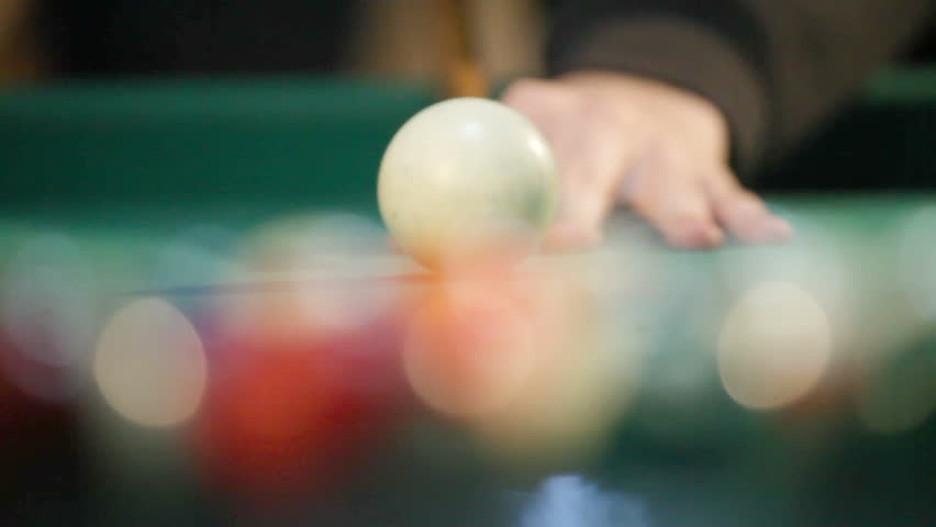 Billiard opening break shot the focus changes from white ball on the black ball | Shutterstock HD Video #1009088339
