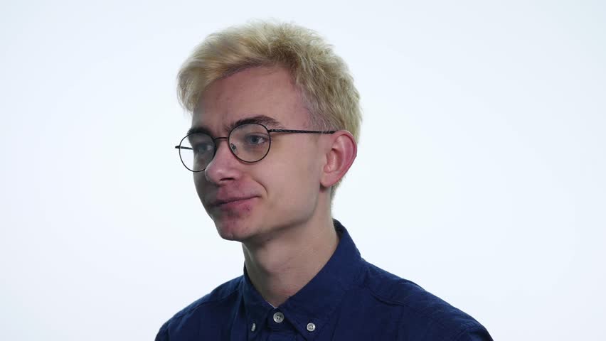 Angry looking man with bat, isolated on a white background