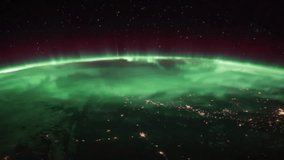 Human shape hologram animation on spinning earth time lapse background with aurora australis and borealis.Symbolic of human space explore technology.