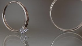 Wedding rings on a homogeneous background