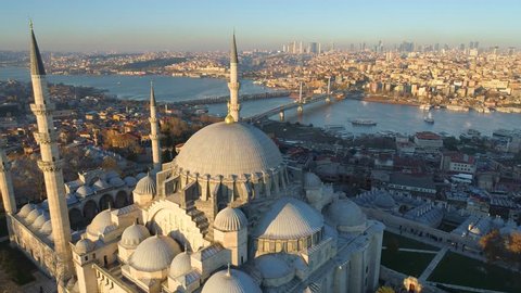 The Blue Mosque (Sultanahmet) in Istanbul, Turkie. Aerial drone view Shot. Sunny day, blue sky, sunset. European part of the city, downtown