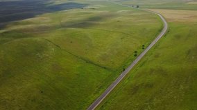 Aerial Video - View Of Green Paddy Fields From Above. Foothills of the North Caucasus. Road to Cherkessk. 4k
