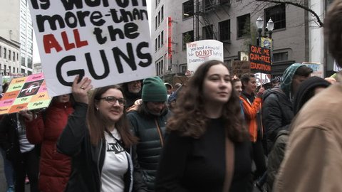 PORTLAND, OREGON / USA - MARCH 24, 2018: People yelling "No More NRA!" during March For Our Lives concerning better gun laws in the United States.