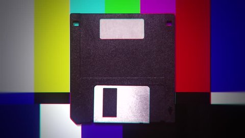 A floppy disk over a changing colorful background. Dubstep distorted colors.
