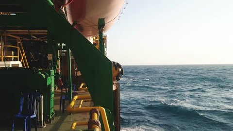 Tender Drilling Oil Rig (Barge Oil Rig) on The Production Platform at Twilight Time