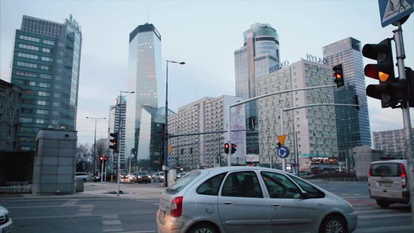 Busy Warsaw city centre with Palace of Culture and Science and other new skyscrapers in the view. One of the highest building of Europe. The Palace of Culture and Science in Warsaw Poland was donated.