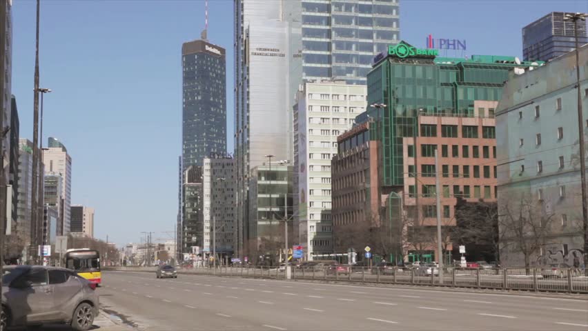 Busy Warsaw city centre with Palace of Culture and Science and other new skyscrapers in the view. One of the highest building of Europe. The Palace of Culture and Science in Warsaw Poland was donated.