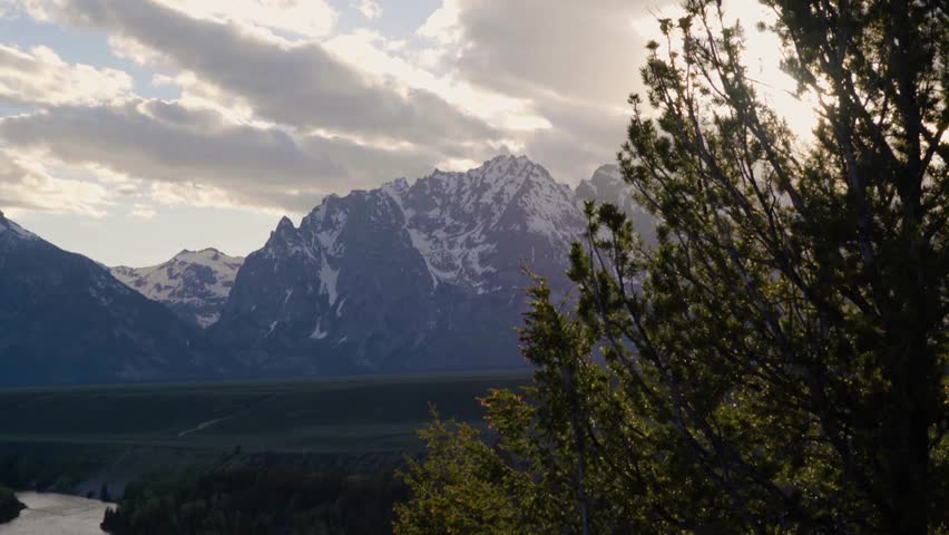 Wyoming Snowcapped Mountains At Sunset By Aerial Drone