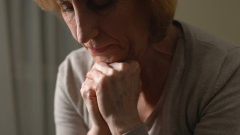 Grief-stricken woman crying unable to accept loss of relative, difficult period