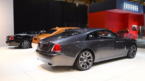 BRUSSELS, BELGIUM - JANUARY 10, 2018: Rolls-Royce Wraith luxury coupe, Rolls Royce Phantom (Rolls-Royce Phantom VIII) and Black Badge Dawn exclusive cars on display at the 2018 European motor show in 