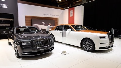 BRUSSELS, BELGIUM - JANUARY 10, 2018: Rolls Royce Phantom (Rolls-Royce Phantom VIII) and Rolls-Royce Wraith luxury exclusive cars on display at the 2018 European motor show in Brussels.