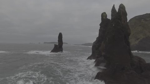 Point-of-interest shot of the Reynisdrangar from the Phantom 4. Video Stok