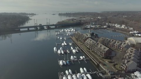 city flight over the river and boat yard Arkivvideo
