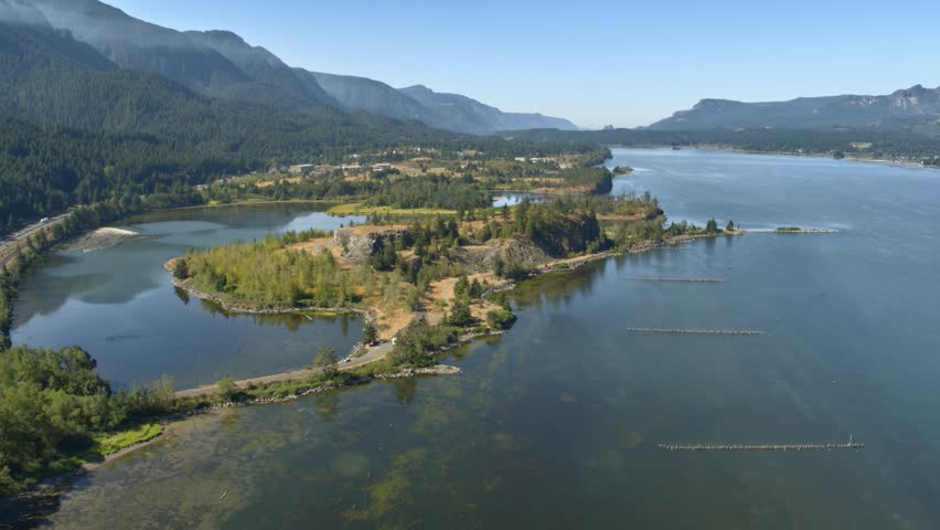 Aerial dolly shot of a small peninsula in the Columbia River Gorge 