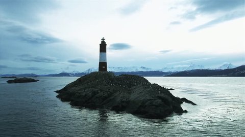 Les Eclaireurs Lighthouse in the Beagle Channel, Tierra del Fuego, Argentina. The Andes Mountains (Cordillera de los Andes) in the Background. 