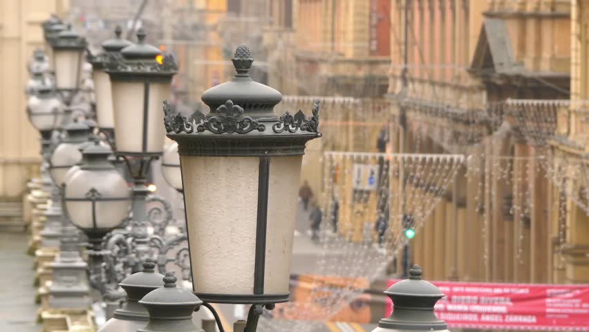 Bologna, Emilia-Romagna Region, Northern Italy: lanterns overlooking street dell
