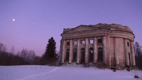 Destroyed church and moon in winter. Video full hd.
