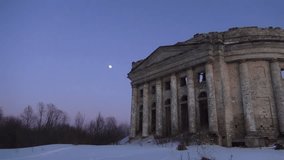 Destroyed church and moon in winter. Video full hd.
