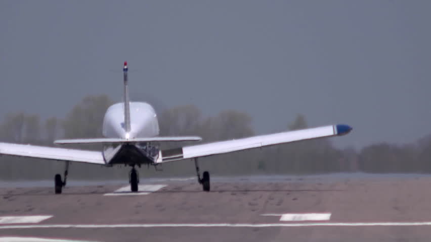 A training aircrft taking off on a teaching flight at Oxford Airport. Apart from training pilots this airfield is used extensively for business and corporate travel. Slow motion lift off.
