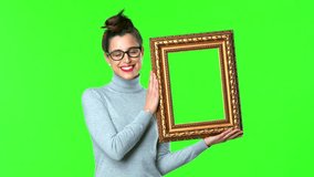 young pretty woman holding a baroque frame