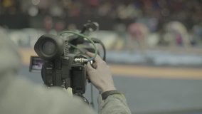 Live. Broadcasting. Camera during shooting sports. Media, news, press, journalist, blogger, TV