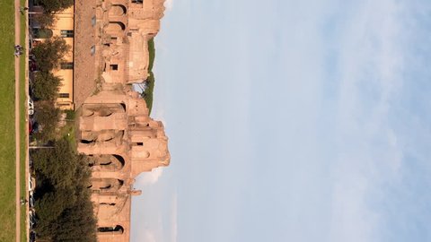 Vertical video. Ruins of the Palatine Hill is the centermost of the Seven Hills. TimeLapse, Rome, Italy
