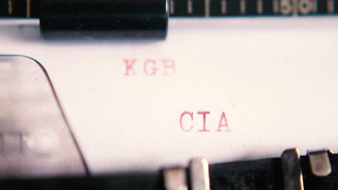 Typing "SOVIET UNION KGB / USA CIA" on an old typewriter