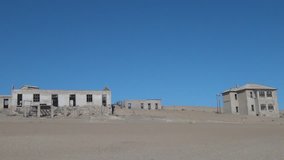 HD high quality summer day video of abandoned diamond mining town of Kolmanskop located near coastal harbour town Luderitz in the Namib Desert Sperrgebiet area in the south of Namibia, southern Africa