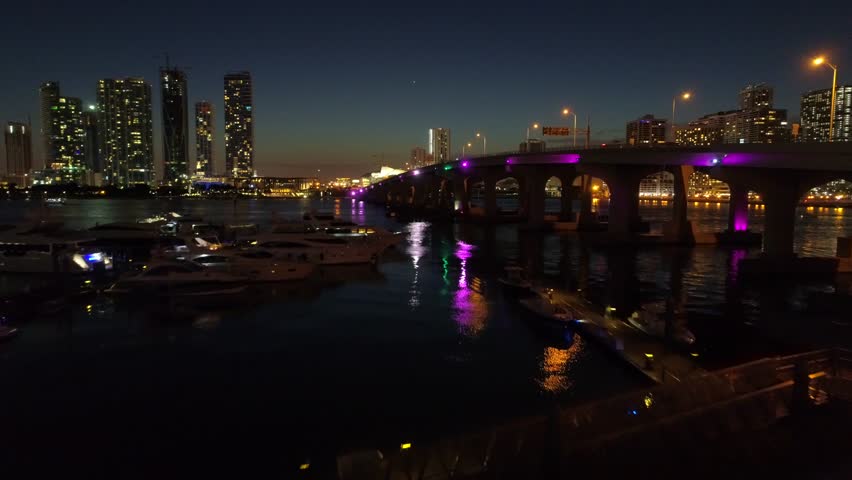 Night aerial drone footage Macarthur Causeway bridge Miami