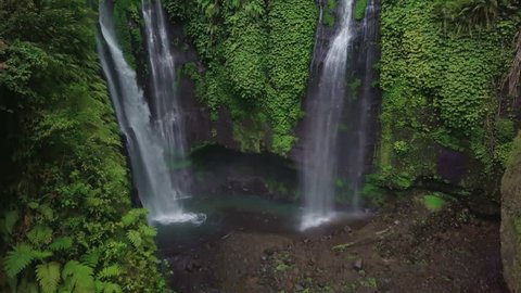 Bali waterfall in jungle drone footage