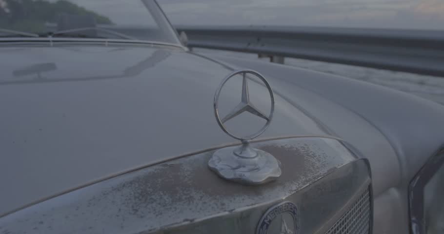CLASSIC MERCEDES BENZ // Vintage Car Emblem Near Ocean